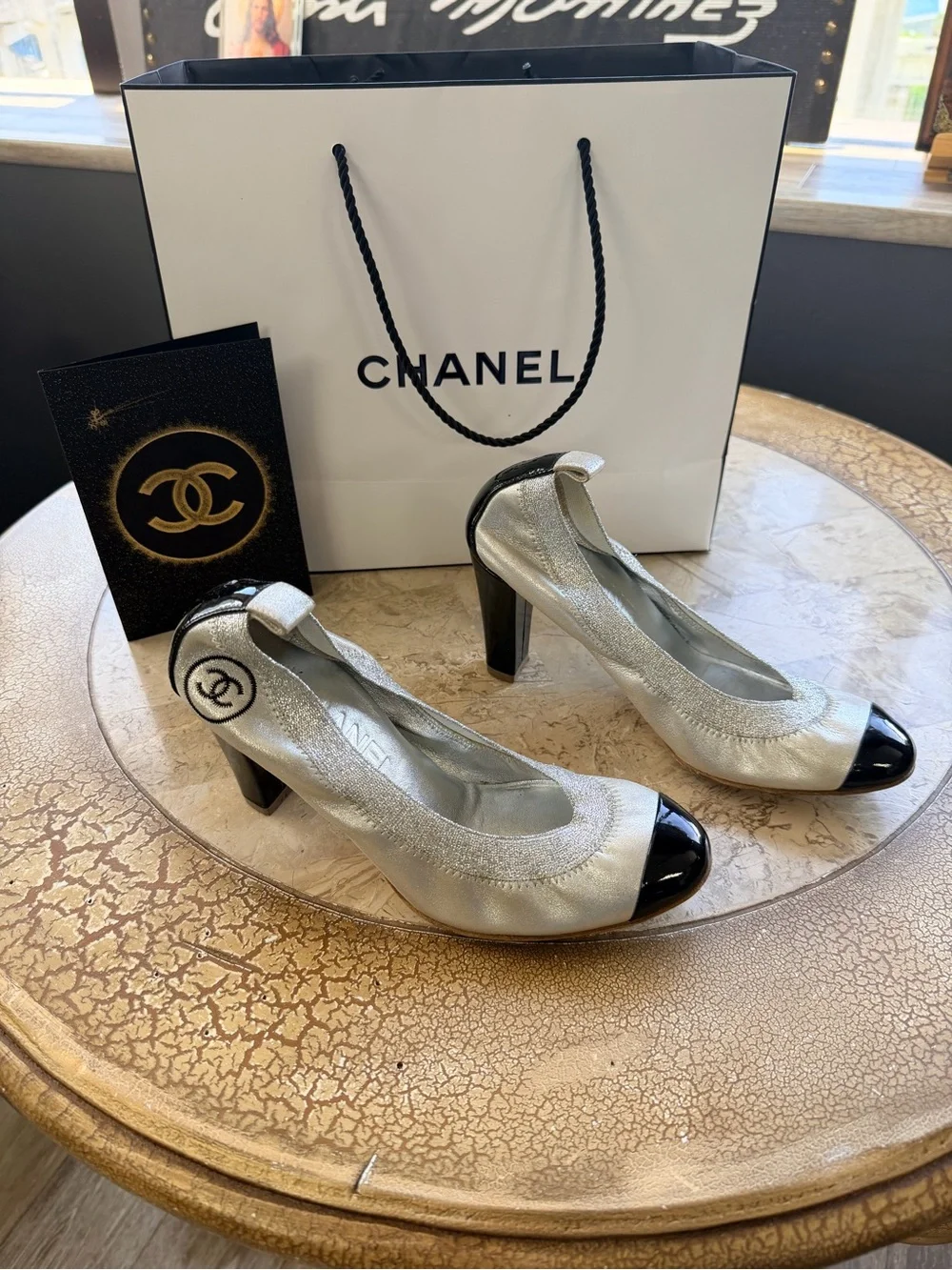 CHANEL Silver Leather Ballet Flats with Black Cap Toe